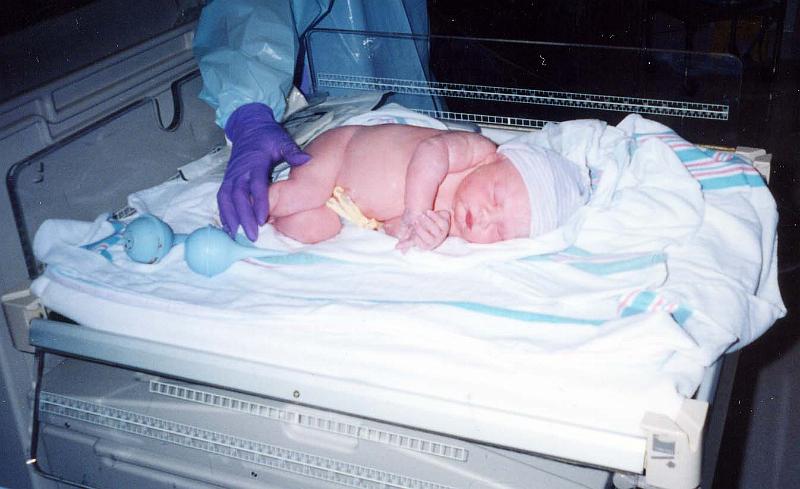 0-01.JPG - August 14th, 2001 - Carisa right after birth. She weighed 7 lbs. 4 oz. and measured 18 1/2 inches.