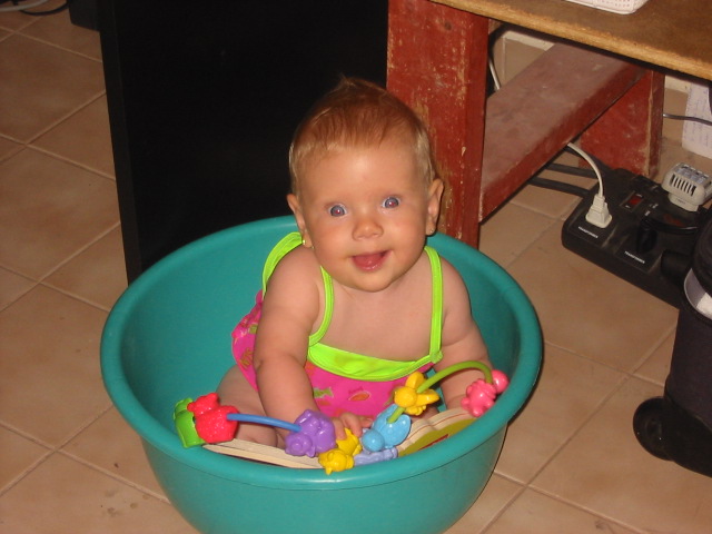 0-13.JPG - Reading a book in a bucket.