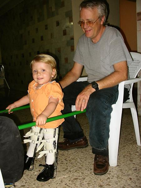 3-04.JPG - Dad helping Kika get some walking practise.