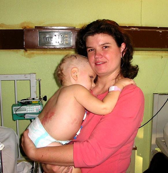 4-20.JPG - Esther holding Kika while the nurses changed her bed.