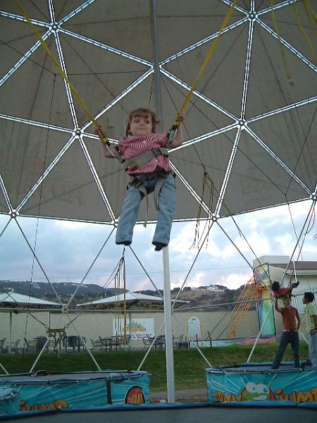 5-08.JPG - Bungee time at a friends birthday party. At first Kika did NOT want to try this, but after a bit of convincing she said it was her favorite ride!
