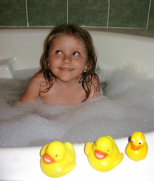 6-27.JPG - Kika in the tub and duckies.