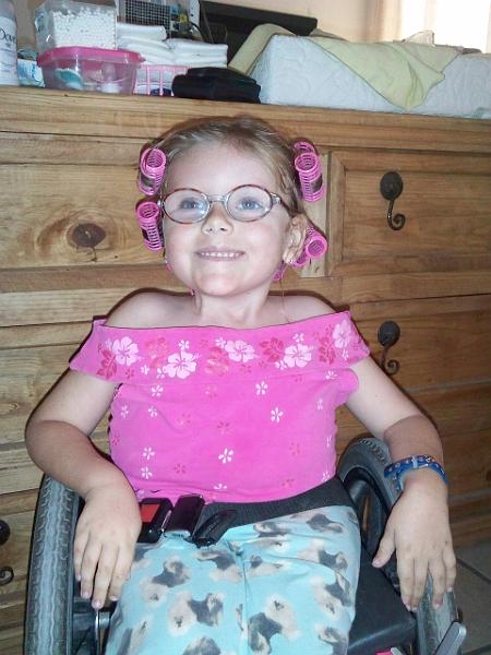 7-20.jpg - Getting her hair ready for the annual school performance